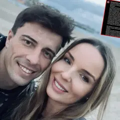 Robert Karaś i jego żona na zdjęciu. Uśmiechnięci, patrzą w obiektyw.