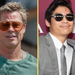 Brad Pitt w okularach i Pax Thien Jolie Pitt w garniturze, uśmiechnięty, obok kobiety.