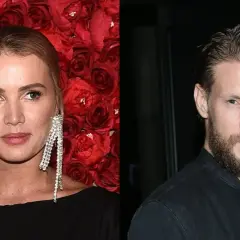 Maffashion w czarnej sukni z błyszczącymi kolczykami obok Fabijańskiego z brodą.