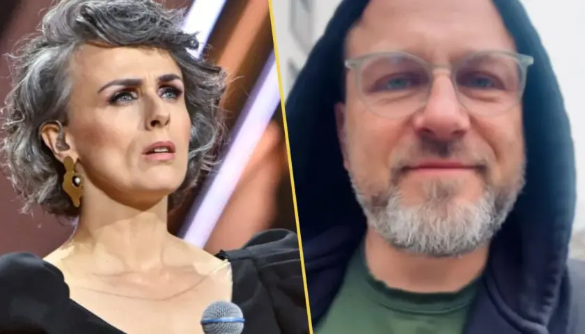Natalia Niemen z mężem. Artystka na scenie, obok niej jej mąż w kapturze i okularach.