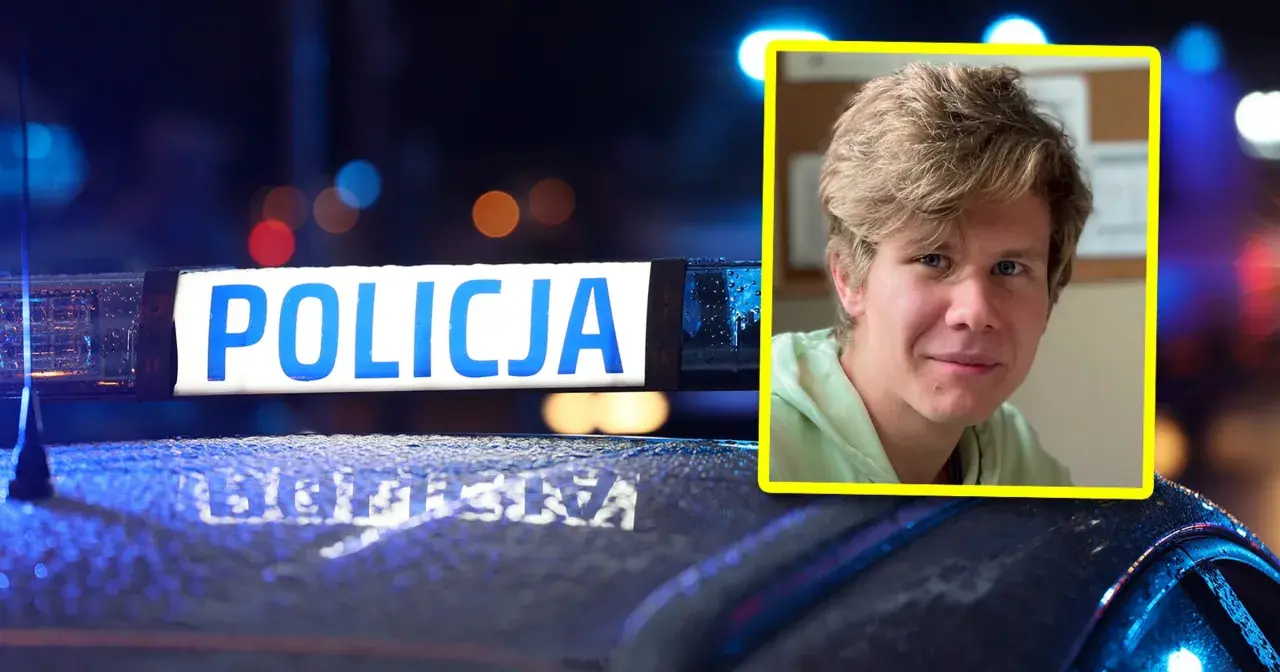 Krzysztof Dymiński na tle policyjnego światła.